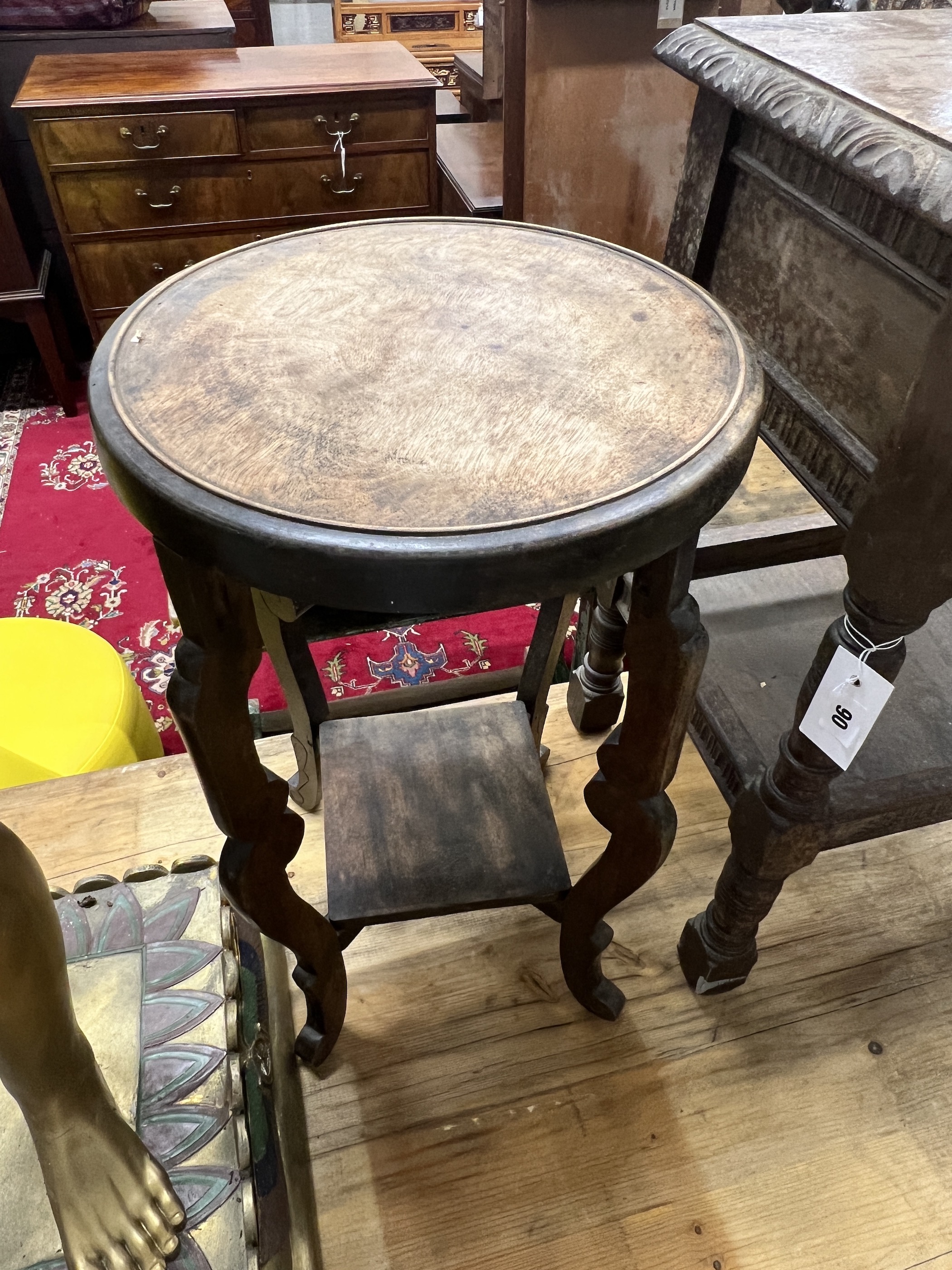 A 17th century style oak two tier occasional table together with a circular occasional table, larger width 43cm, height 63cm
